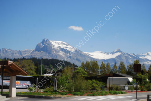 Blue sky and snow topped mountains