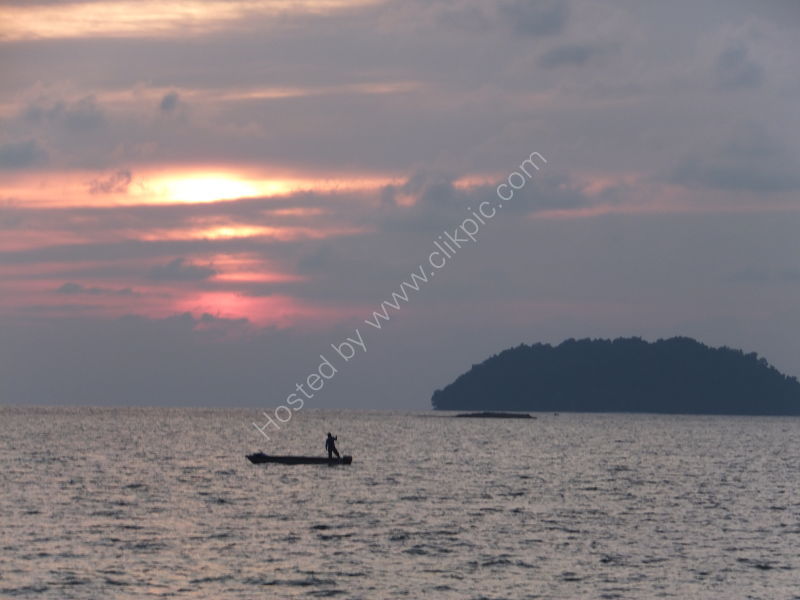 Sunset & Fisherman