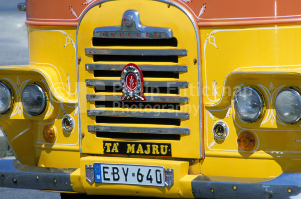 Front of A Yellow Malta Bus