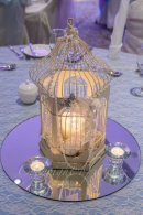 Birdcage draped in pearls