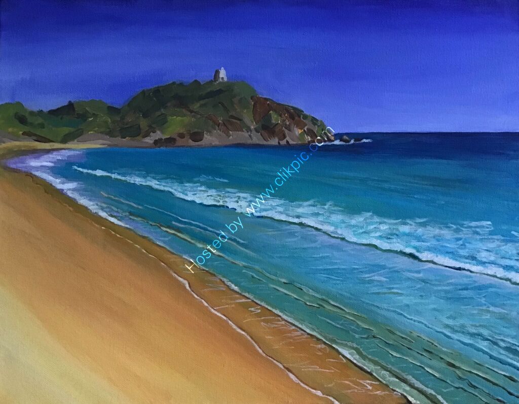 Golden sands, rich turquoise sea and cloudless blue sky of a beach in Sardinia