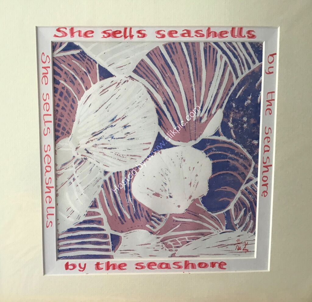 A linocut print showing seashells, pink and navy, words around mount