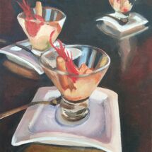 Plates with prawn cocktail glasses plates on a table