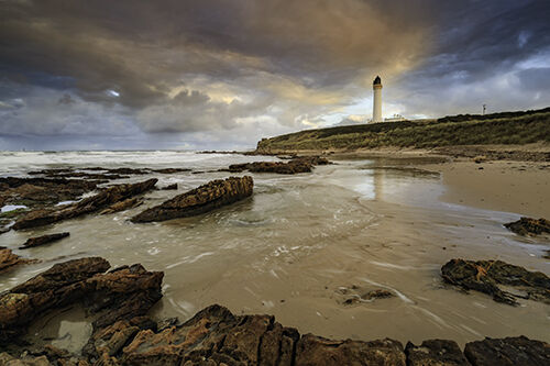 COVESEA LIGHTHOUSE AT SUNRISE