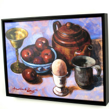 Red plums in a Blue bowl with other objects