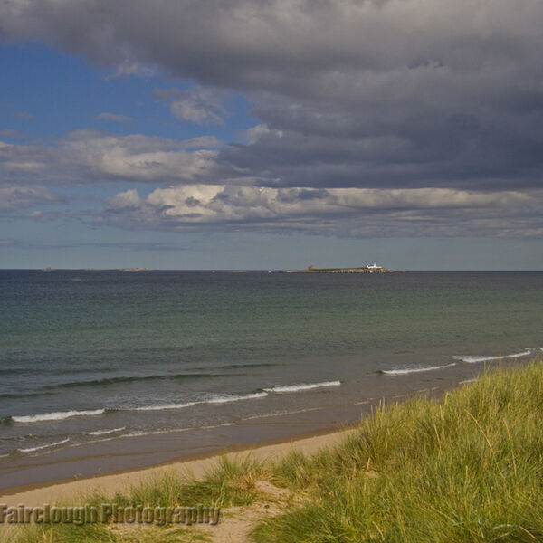 Northumberland coast at Bamburgh with view to the Farne islands