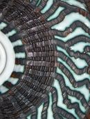 Detail - Wheel-thrown, hand-carved, wall-mounted disc