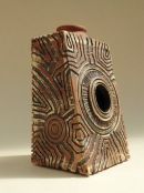 'Hand-built, hand-carved standing form'
