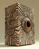 Hand-built, hand-carved, standing form