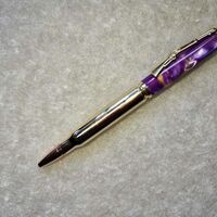 Twist Pen = Purple and Gold Pearl on 308 Cartridge