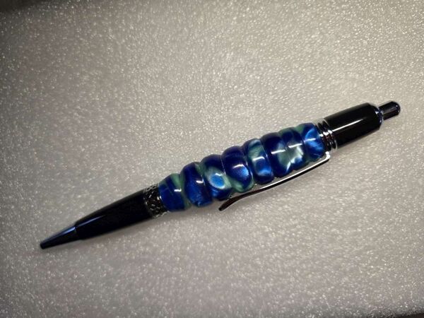 Click Pen = Raging Blue Rapids on Chrome and black resin