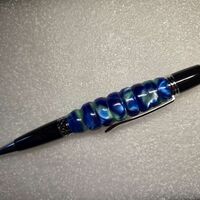 Click Pen = Raging Blue Rapids on Chrome and black resin
