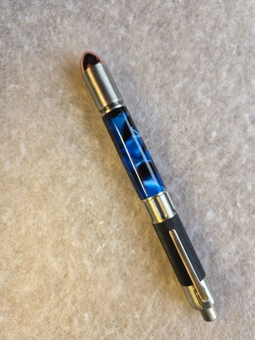 Novelty Pen = 45 Caliber midnight blue.