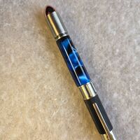 Novelty Pen = 45 Caliber midnight blue.