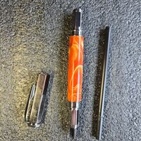 Rollerball Pen = Molten copper on gunmetal