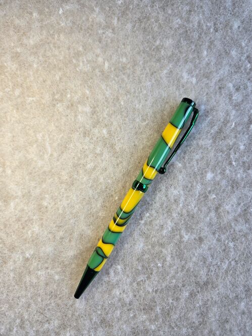 Twist Pen = Green and yellow swirls on green mechanism