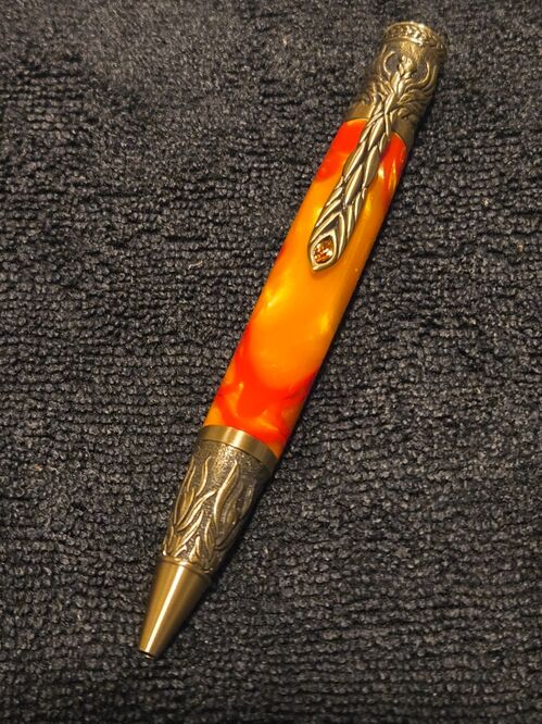 Phoenix antique Brass in Orange Flames