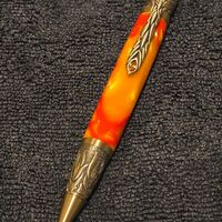 Phoenix antique Brass in Orange Flames