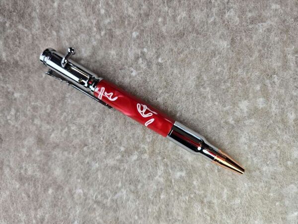Bolt Action = Red Swirl on chrome Rifle Cartridge