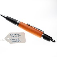 Click Pen = Amber acrylic on chrome and black resin
