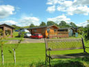 Front of Lodge showing parking and decking