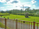 View from decking of Lodge looking over bottom of Park area