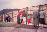 The Onlookers. Taken at Portishead Swimming Pool during construction April 1962