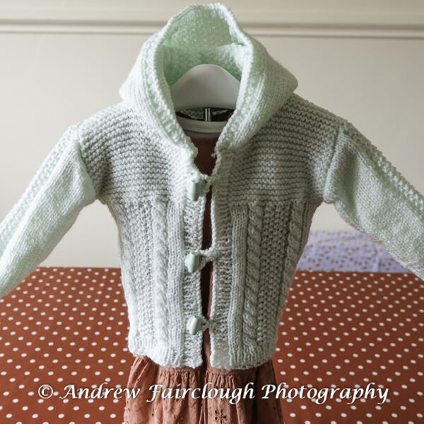 Mint Green Cable and Moss Stitch Hooded Jacket.