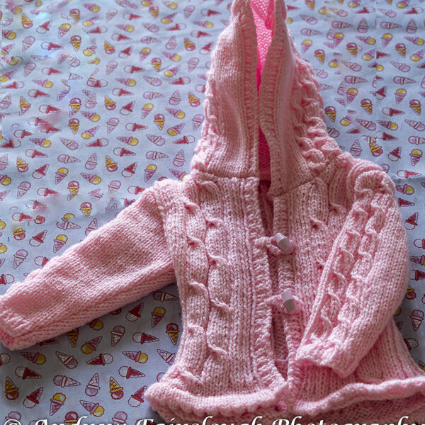 Fluted Waistband and Cable Hooded Jacket - Pink including measurements.