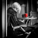 Blonde with red coffee cup