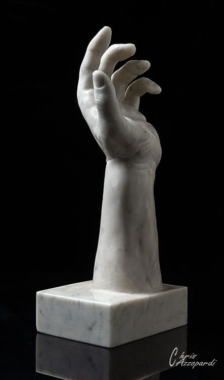 Life size hand carved in White Carrara marble