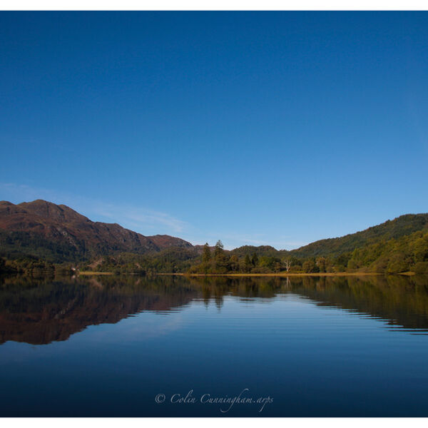 A view of Ben Venue and Ben A'an from Loch Achray.