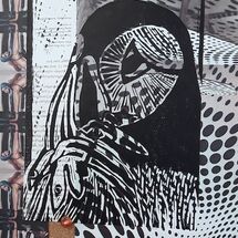 Lino cut print on assorted papers by Maggie Brown