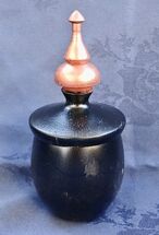 "Small pot in Sapele with copper painted finial" by Colin McKenzie