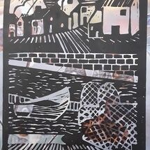 Lino cut print on magazine paper by Ingrid Mayes