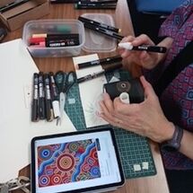 Indigenous inspired candle painting