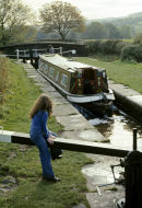 Macclesfield canal lock with narrowboat.