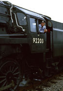 Engine driver on preserved loco 92203 "Black Prince", Cranmore, Somerset in late 70's.