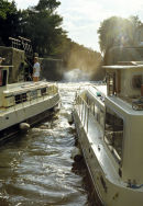Boats in locks on the Canal du Midi, France.
