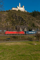 Freight train passing the Marksburg, Braubach.