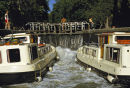 Boats in locks on the Canal du Midi, France.