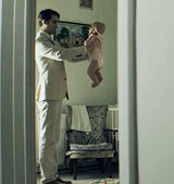 Oddball picks up the baby