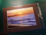 Mounted print in cellophane bag