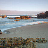 Sunrise with surf, Arriba