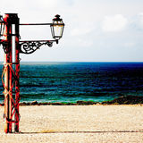 Three lights on green sea