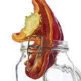 Red pepper with glass jar