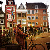 Two girls on bicycles, Amsterdam