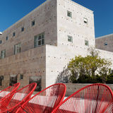 Red string chairs with concrete, Lisbon