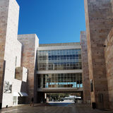 Man with converging buildings