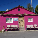 Mauve house with chairs